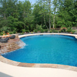 deep blue pool with waterfall