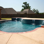 curved edge pool with water features