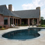 round edge pool with seating area