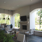 outdoor living space including kitchen, seating area, TV and more