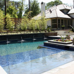 L-shaped pool with flat water spouts