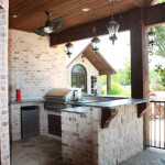 chicago brick outdoor kitchen with stainless steel grille and dish washer