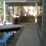 outdoor kitchen area off spa