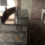 decorative tile work on outdoor kitchen