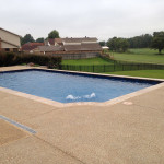 scalloped corner rectangular pool with fountains